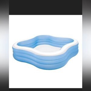 Blue and White Inflatable Pool